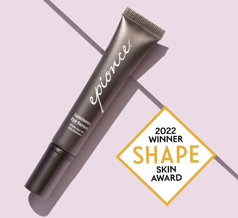 A picture of the shape skin award logo next to a tube of makeup.