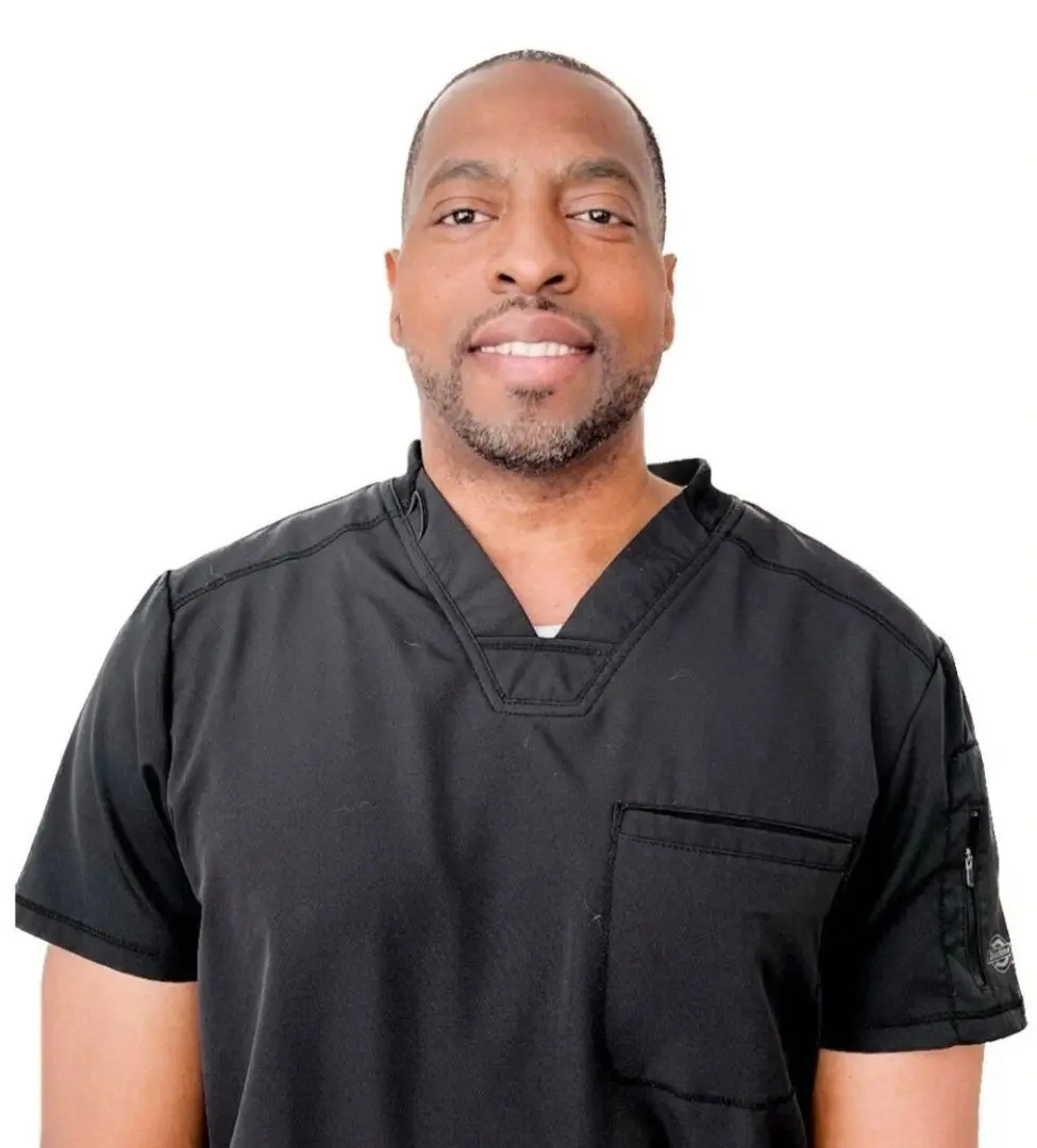 A man in black shirt and white background