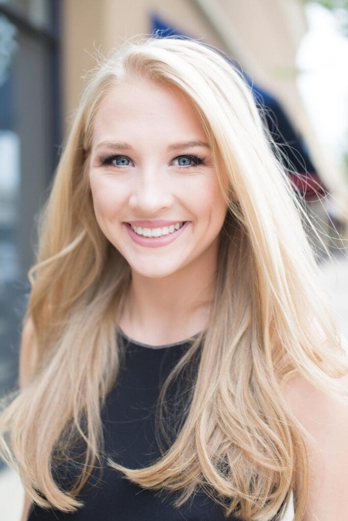 A beautiful blonde woman with long hair.